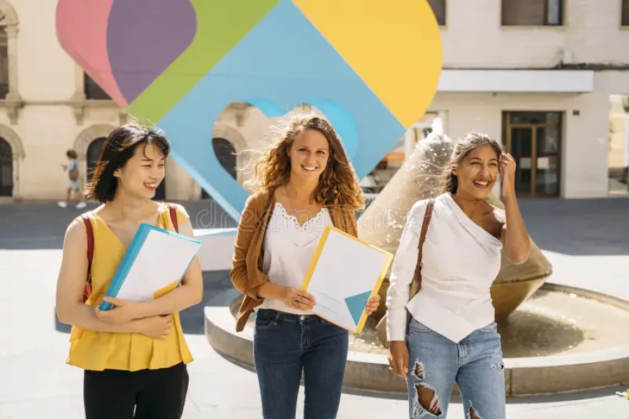 university-exchange-students-walking-smiling-campus-three-happy-female-university-exchange-students-walking-together-356575963